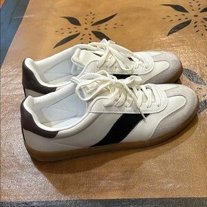 Stylish White and Black Sneakers